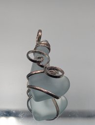 Hand-Wrapped Frosted Light Blue Sea Glass Pendant In Spiral Silver Wire