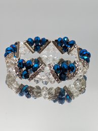 Stretch Bracelet With Blue And Clear Faceted Beads