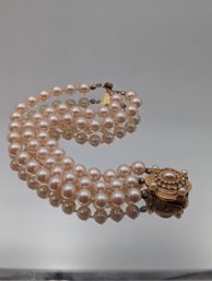 Vintage CAROLEE Triple Strand Faux Pearl Bracelet With Ornate Rhinestone Clasp