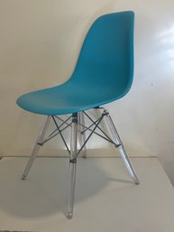 Eames-style Molded Plastic Side Chair With A Lucite Eiffel Base.