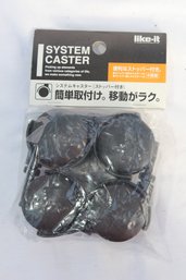 4 Casters From Container Store (D-27)