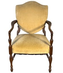 Vintage Victorian Style Armchair With Light Yellow Velvet Upholstery And Dark Wood Frame