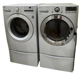 LG Front Load Washer And Dryer Set With Pedestals