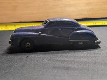 1950s Schuco Gama 100 Tin Windup Toy Car, Designed As A Buick Sedan And Produced In The US Zone Of Germany
