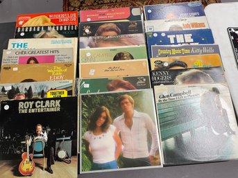 63 RECORDS LOT: TAMMY WYNETTE CARPENTERS ROY CLARK CHER PPM MORE