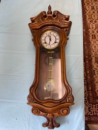 CARVED WOOD WALL CLOCK