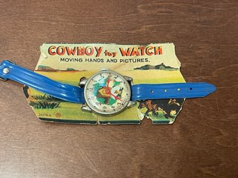 VINTAGE CHILDS COWBOY WATCH JAPAN MOVING HANDS AND PICTURE