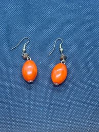 Vintage Unmarked Orange Pendant Earrings Bakelite(?)