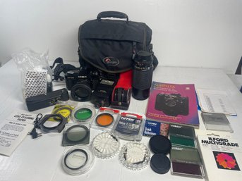 Minolta SLR Camera And Accessories With Bag