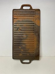 Cast Iron Griddle Roughly 16.5 Inches Long And 9 Inches Wide