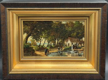 Vintage Framed Oil Painting Depicting A Rural Landscape Scene With A Watermill, Trees, And Figures By A Stream