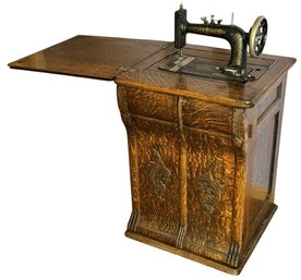 Gorgeous Antique New Home Sewing Machine Tiger Oak Cabinet - (D)