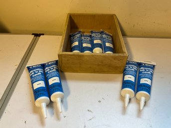 Grouping Of White Tub And Tile Caulk