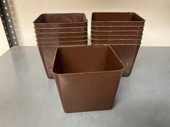 Grouping Of Brown Plastic Bins