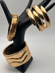 Chunky Bold Spring Hinged Gold Tone Bracelets