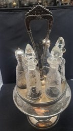 Silver Plate Victorian Condiment Set With 6 Bottles.