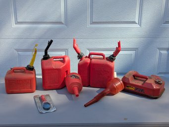Lot Of 4 Gas Cans & Related  Including A Metal Marine Can