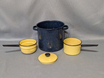 An Enamelware Pot Together With A Double Boiler