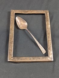 2.96 OZT Sterling Silver - A Pictured Frame & A Spoon