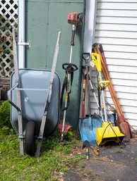 Wheelbarrow With A Lot Of Lawn & Garden Tools