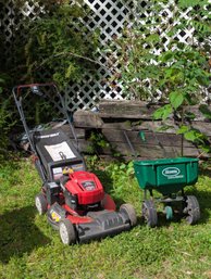 Nice Troy-Bilt Gas Powered Lawn Mover Together With A Lawn Spreader