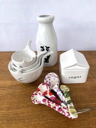 Collection Of Pottery Kitchen Vessels And Utensils With A Cat Theme