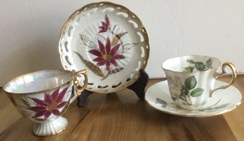 2 Tea Cups And Saucers
