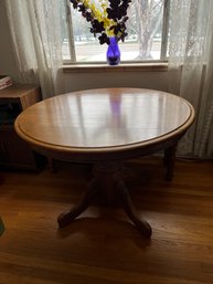 Spencer Pedestal Solid Oak Table 42-inch Round Drop Leaf