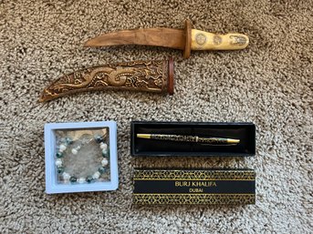 Pen From Burj Khalifa, Carved Wood Knife And Bracelet From Malaysia