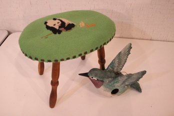 Small Foot Stool With Panda Cross Stitched On Green Background And A Ceramic Humming Bird House