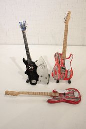 3 Miniature Replica Guitars By Axe Heaven And Gene Simmons