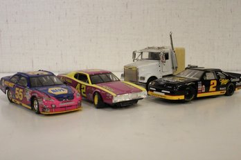 A Set Of 3 Die-cast Race Cars And Semi Truck, No Trailer And Some Model Parts
