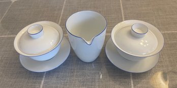 White Ceramic Tea Cups And Pitcher