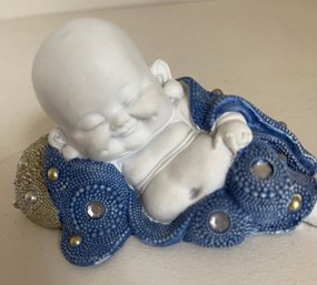 Reclining Monk Figurine