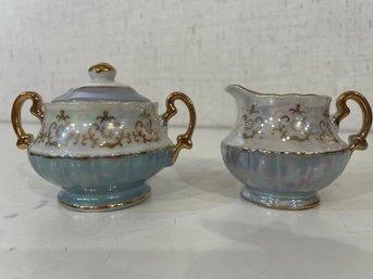 Opalescent Cream And Sugar Porcelain Dishes