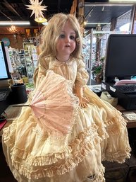 Antique Child Size Doll 1910, In Original Clothing Of Cream/yellow Colored Silk, Tule And Muslin