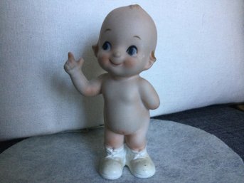 Bisque Kewpie Doll With White Baby Shoes