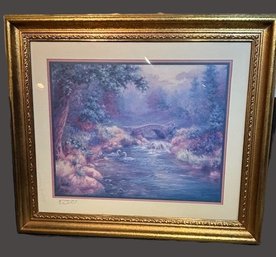 Framed Art Print Featuring Two Swans In A Landscape.