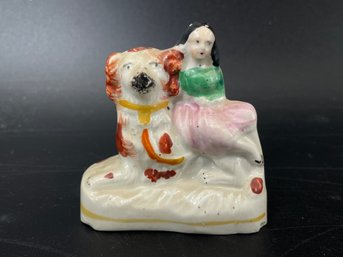 English Staffordshire Porcelain Figure Depicting A Girl And A Dog
