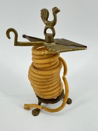 Brass Wax Jack With Original Wax With Bird Finial And Brass Legs