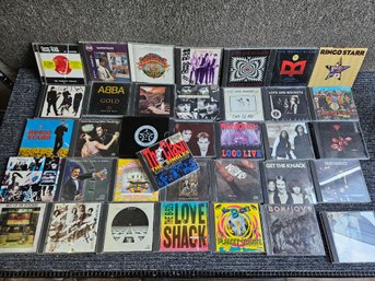 J93 - Rock CD Lot#1 - The Clash - Ramones - Bon Jovi - B-52's- Beatles