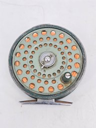 Vintage Heddon 320 Fly Reel, A Collectible Fishing Reel Known For Its Signature 'Heddon Green' Finish