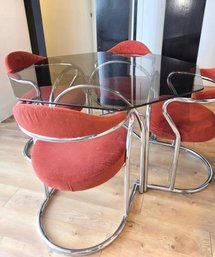 1970s Chromcraft Dining Set Featuring A Smoked Glass Table Top And Chairs With Red Velvet Upholstery
