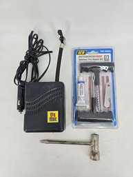 Collection Of Automotive Tools For Repairing Flat Tires - Repair Kit, Lug Wrench, And Portable Inflator