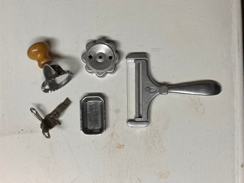 Lot If Kitchen Gadgets Cheese Slicer, Ravioli Press, Condiment Tray, Cookie Cutter, Can Opener