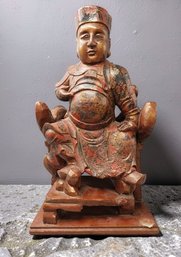 ANTIQUE POLYCHROME WOOD FIGURE OF A SEATED OFFICIAL — CHINA, QING DYNASTY (19TH CENTURY)