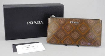 RARE PRADA COGNAC AND MALVA CLUTCH BAG WALLET WITH COA AND BOX