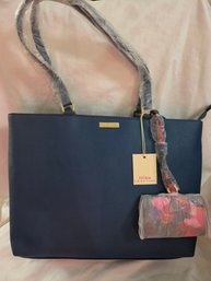 Trina Turk Navy Blue Pebbled Faux Leather Tote Featuring Gold-tone Hardware And A Matching Pink-and-purple Flo