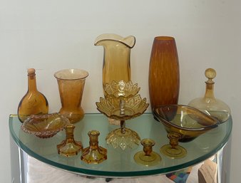 Lot 2 Of Amber Glass Vases And Candle Sticks