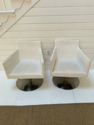 Pair Of Leather Swivel Chairs